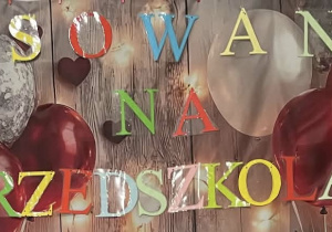 Dekoracja na pasowanie przedszkolaka wisząca w sali przedszkolnej